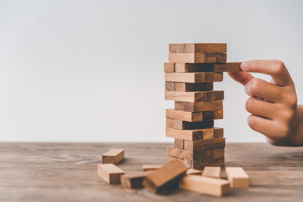 Person Playing Jenga Game 